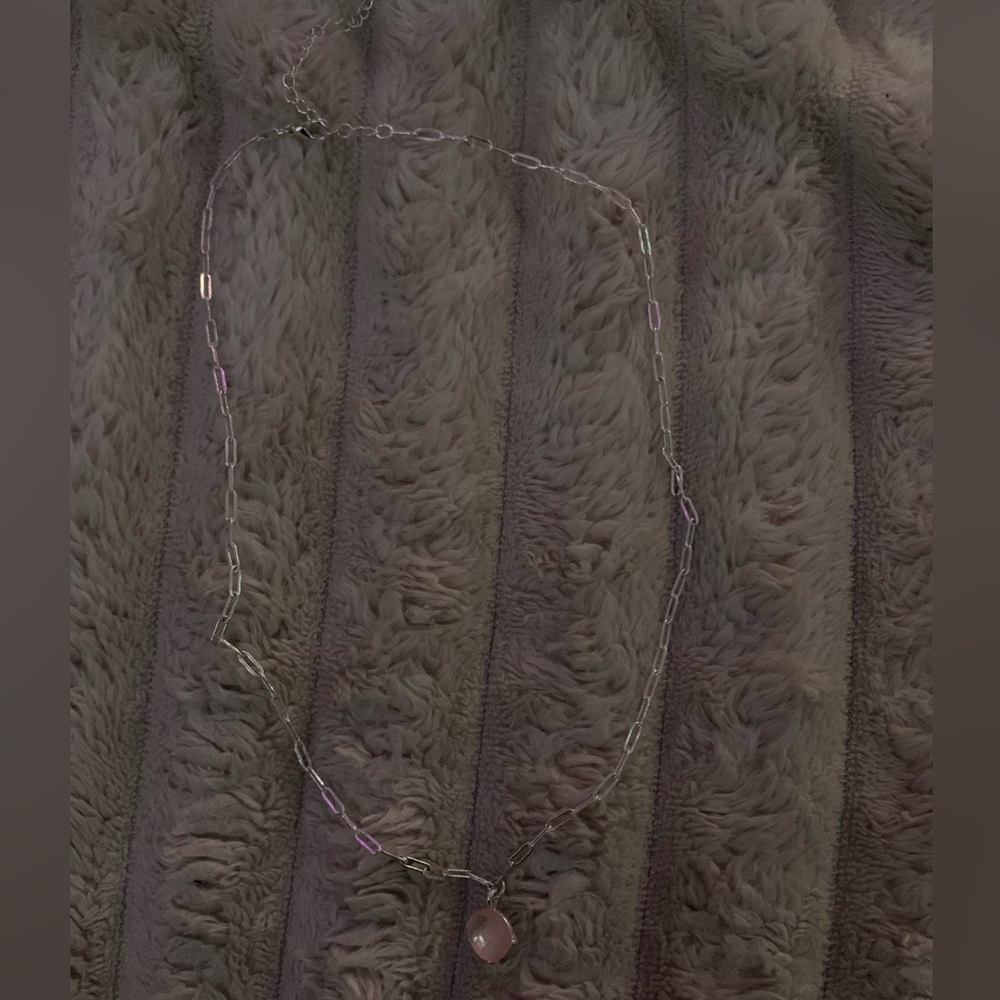 Silver necklace with pink gemstone pendant